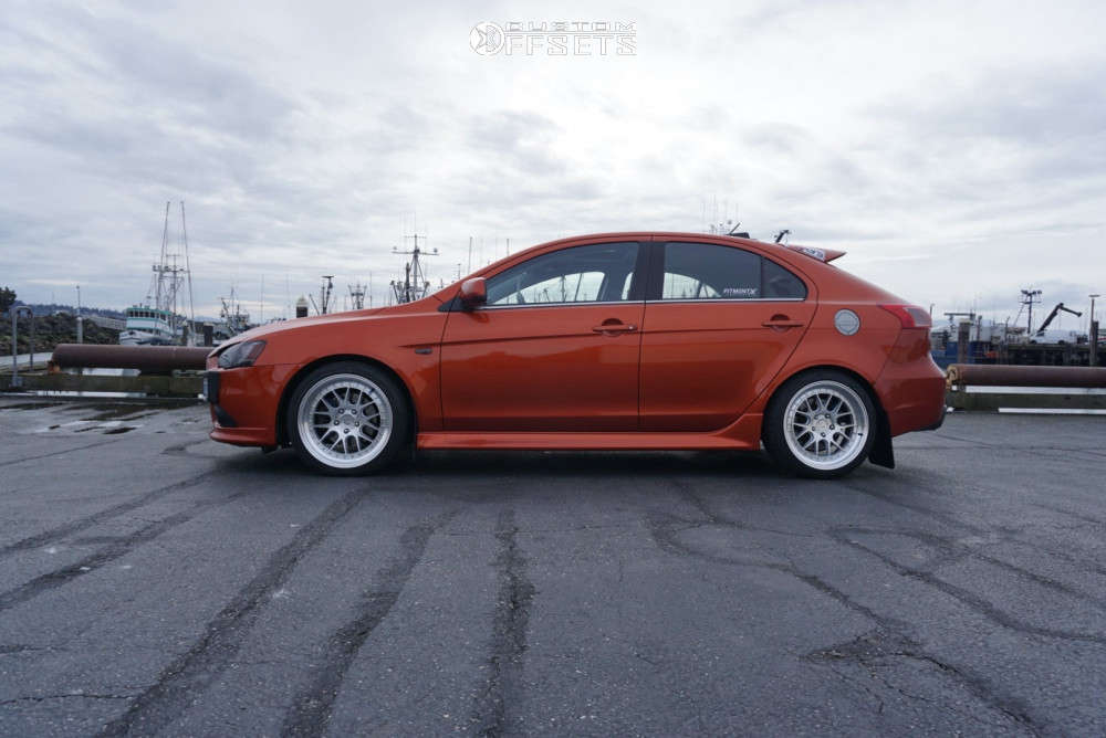 2011 Mitsubishi Lancer with 18x8.5 35 Aodhan Ds06 and 235/40R18 Toyo Tires  Extensa Hp Ii and Lowering Springs | Custom Offsets