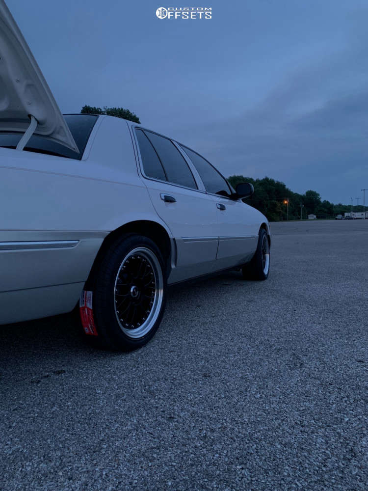 2007 Mercury Grand Marquis with 18x8.5 25 XXR 521 and 255/40R18 Vercelli  Strada Ii and Stock | Custom Offsets