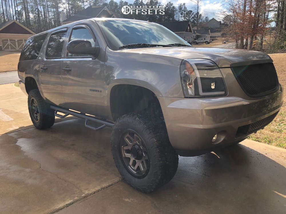 2011 GMC Yukon XL 1500 with 20x9 24.35 Ultra Warlock and 35/12.5R20  Thunderer A/T-R and Suspension Lift 7" | Custom Offsets