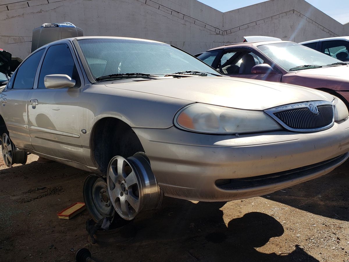 Junked 1998 Mercury Mystique with 5-speed manual transmission