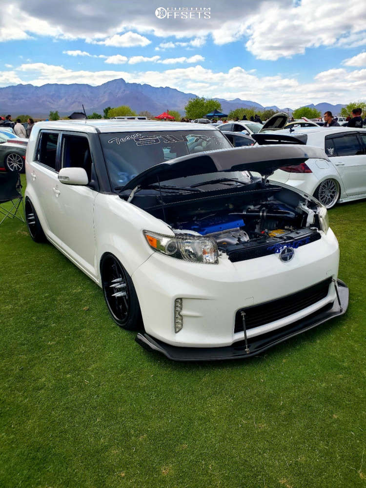 2015 Scion XB with 18x9.5 30 ARC AR5 and 225/40R18 Lexani Lxuhp-207 and Air  Suspension | Custom Offsets