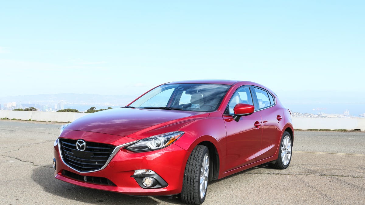2014 Mazda3 s Grand Touring 5-Door review: Premium feel and tech in an  economy car - CNET