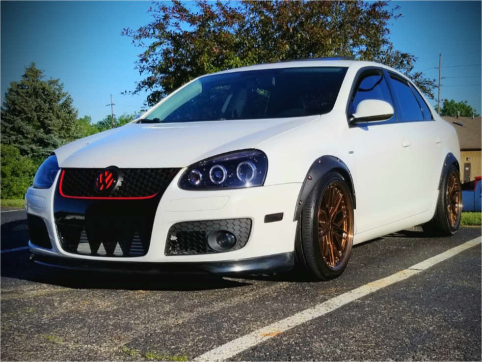 2010 Volkswagen Jetta with 18x8.5 35 XXR 571 and 225/40R18 Hankook Ventus  V2 Concept 2 and Coilovers | Custom Offsets