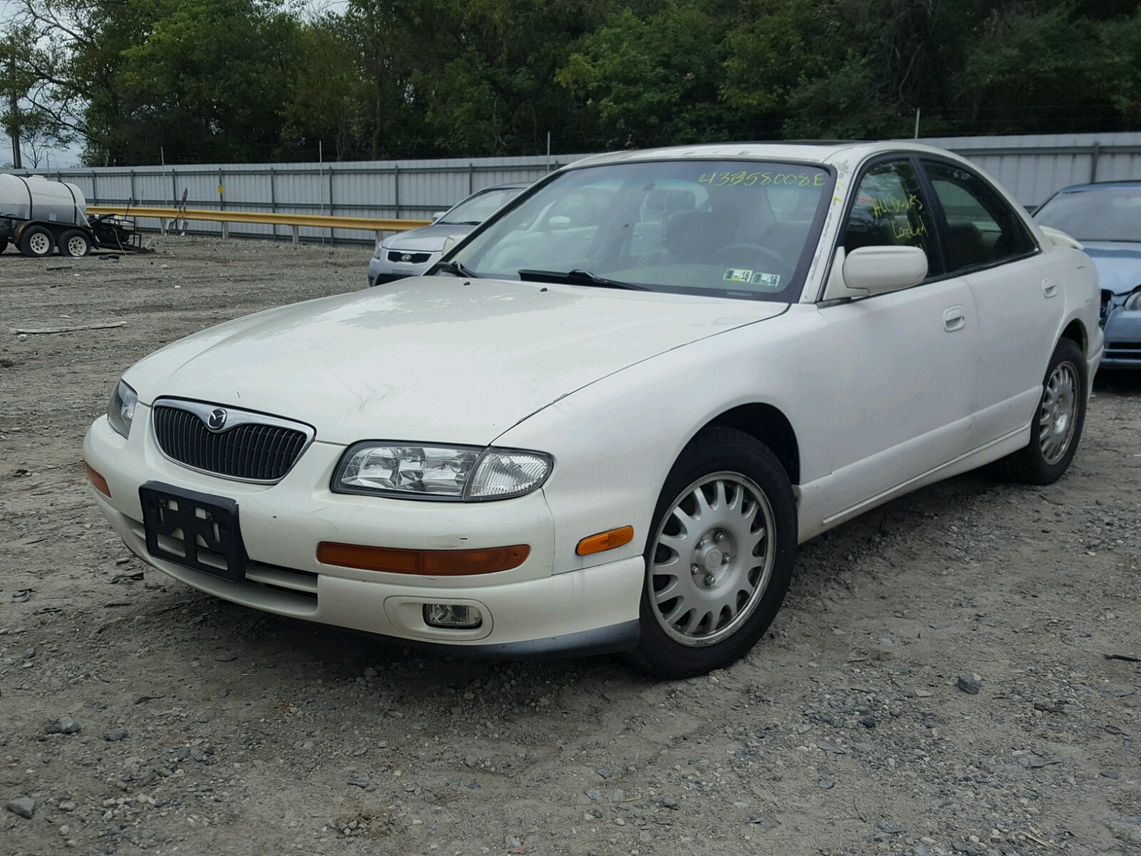 MAZDA MILLENIA 1998, JM1TA2217W1408154 — Auto Auction Spot