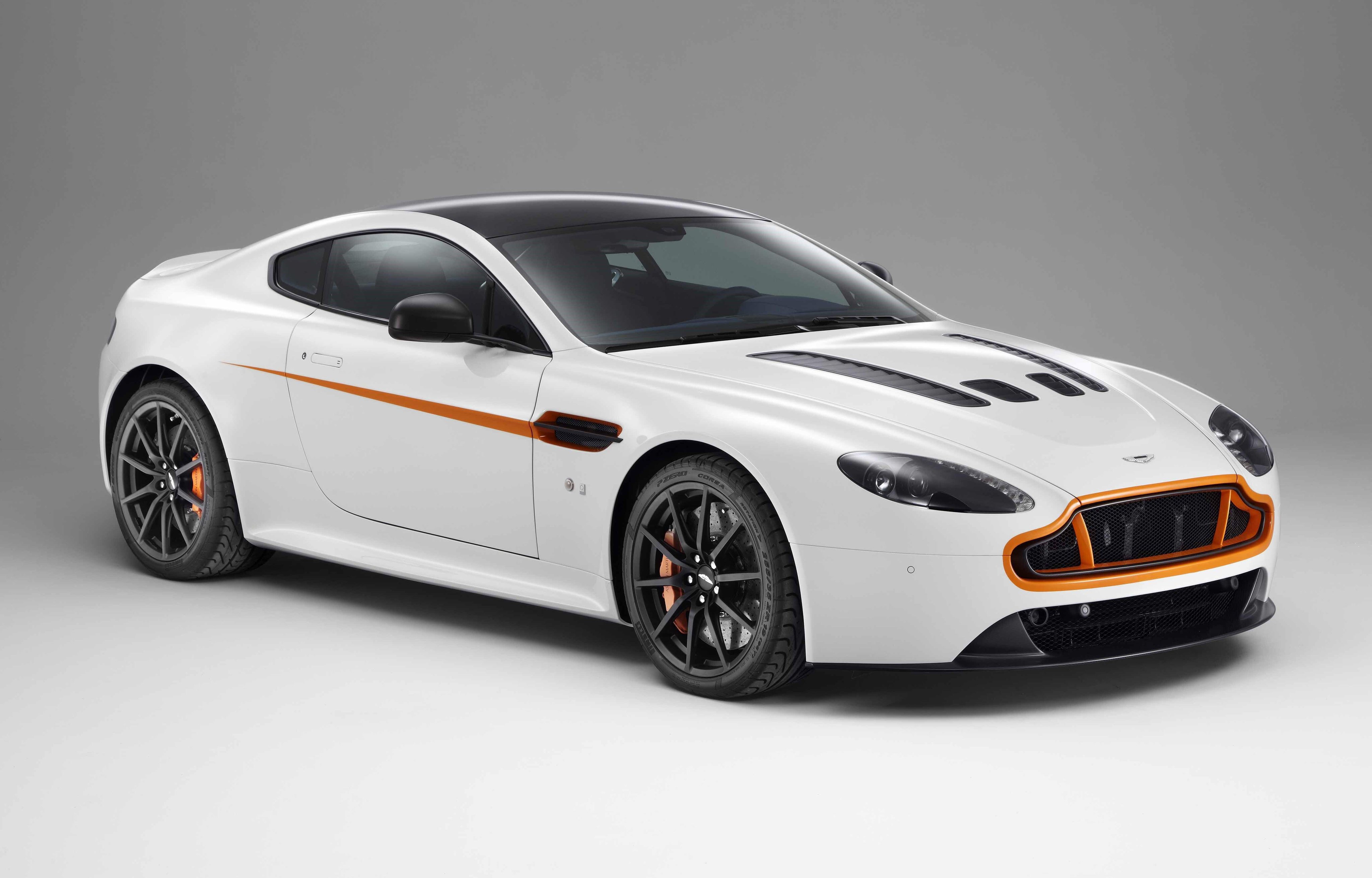 Aston Martin on Twitter: "This Q by Aston Martin V12 Vantage S is proving  extremely popular on our stand - Stratus White meets Vibrant Orange!  http://t.co/d7wCbjkjuR" / Twitter