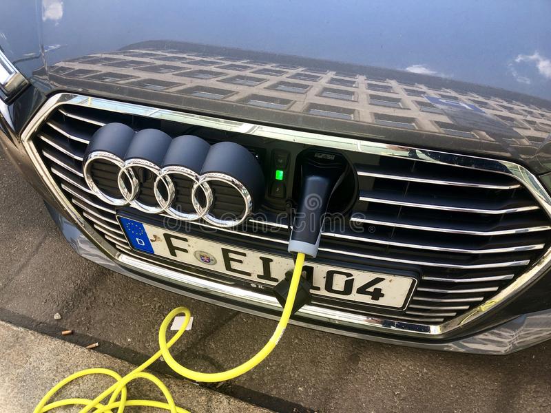 An Audi A3 E-tron Plug-in Hybrid Car Charging in the Streets of Leipzig,  Germany. Editorial Photo - Image of connector, charge: 157996511