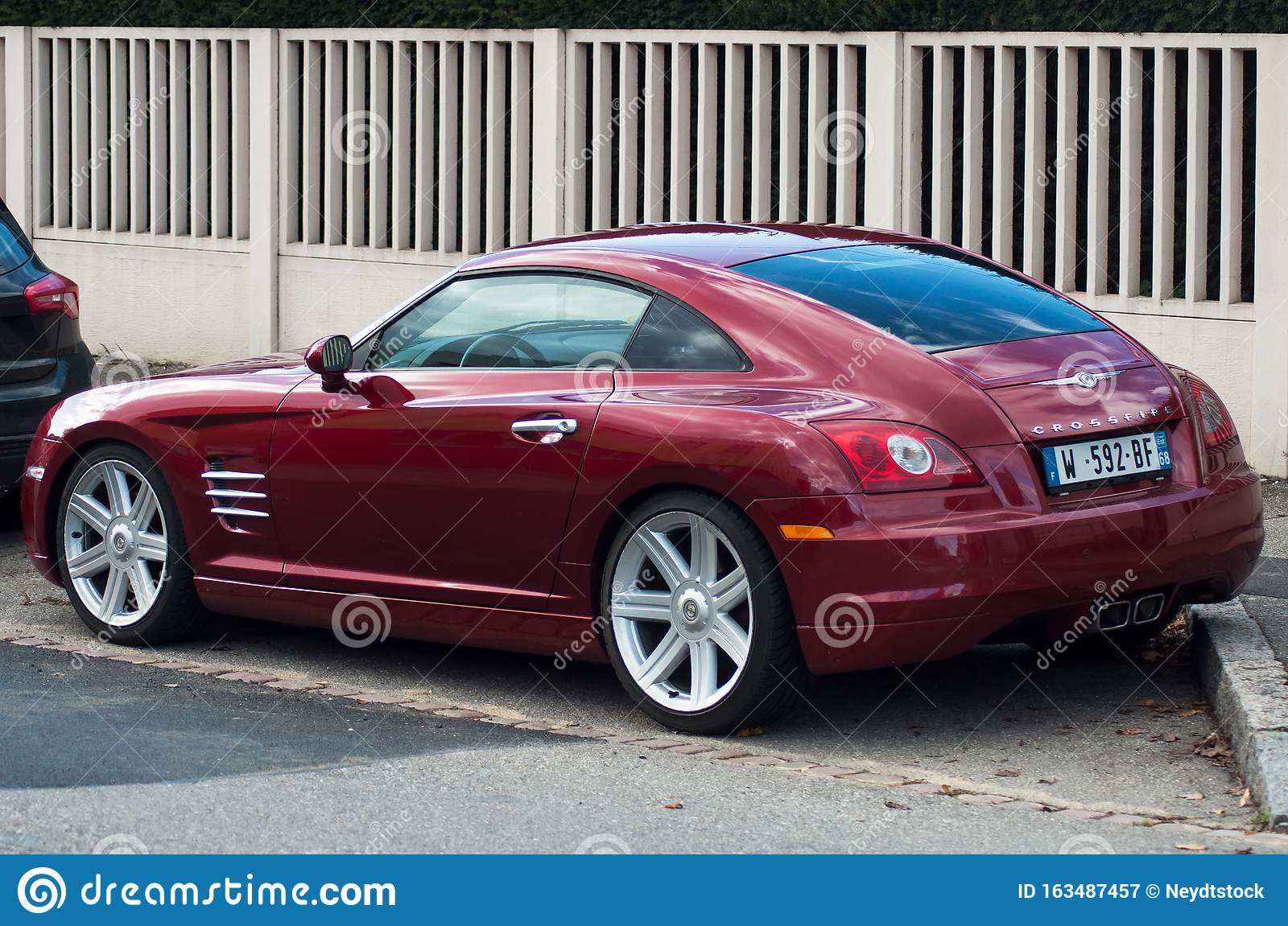 Rear View of Red Chrysler Crossfire Parked in the Street Editorial  Photography - Image of engine, cars: 163487457