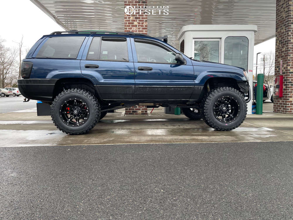 2001 Jeep Grand Cherokee with 18x12 -44 Fuel Hostage and 33/12.5R18  BFGoodrich Mud-terrain T/a Km3 and Suspension Lift 4.5" | Custom Offsets