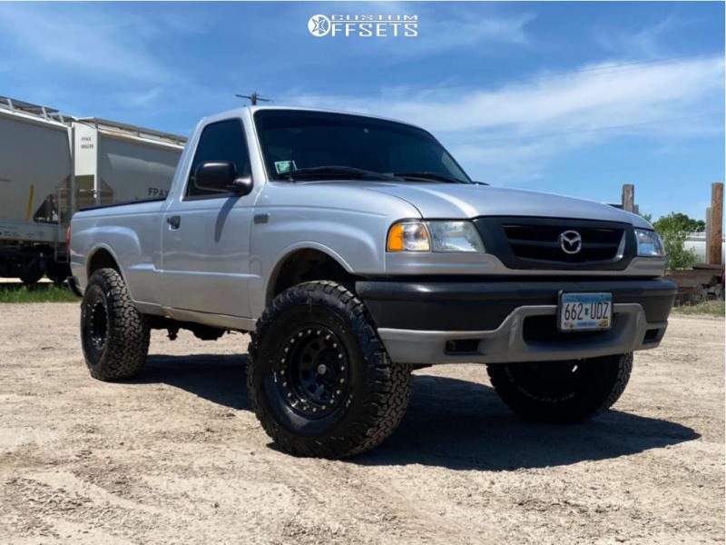 2002 Mazda B2300 with 15x8 -19 Pro Comp Series 252 and 32/11.5R15  BFGoodrich All Terrain TA KO2 and Suspension Lift 4" | Custom Offsets